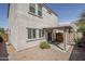Low maintenance backyard features patio, rock landscaping, and privacy at 13083 N 87Th Dr, Peoria, AZ 85381