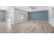 Spacious living room offers sleek floors, natural light, and transitions into the backyard space at 15825 W Acapulco Ln, Surprise, AZ 85379