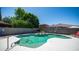 Enjoy a sparkling pool with a basketball hoop for Gathering fun and outdoor enjoyment at 15825 W Acapulco Ln, Surprise, AZ 85379