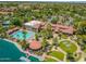 Aerial view of the community's clubhouse, pool, and surrounding lush landscaping at 1633 E Lakeside Dr # 25, Gilbert, AZ 85234