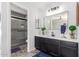 Stylish bathroom with a modern shower, vanity with black cabinets, and contemporary finishes at 1633 E Lakeside Dr # 25, Gilbert, AZ 85234
