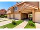 Charming townhome featuring private garages, ample parking, and well-maintained landscaping at 1633 E Lakeside Dr # 25, Gilbert, AZ 85234