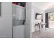 Convenient laundry closet with a stacked washer and dryer unit at 1633 E Lakeside Dr # 25, Gilbert, AZ 85234