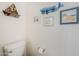 Close up on the half-bathroom with nautical decor at 1718 W Colter St # 184, Phoenix, AZ 85015