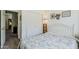 Cozy bedroom features a full size bed, white closets, and decor at 1718 W Colter St # 184, Phoenix, AZ 85015