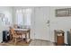 Bright entryway featuring tile flooring, a desk, and a conveniently located front door at 1718 W Colter St # 184, Phoenix, AZ 85015