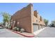 Condominium exterior with a garage and landscaped surroundings at 1718 W Colter St # 184, Phoenix, AZ 85015
