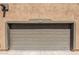 Exterior view of a garage door of condo unit 184 at 1718 W Colter St # 184, Phoenix, AZ 85015