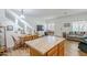 Bright, updated kitchen with an island open to the living and dining area at 1718 W Colter St # 184, Phoenix, AZ 85015