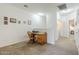 Office with a desk, chair, carpeted flooring, and natural lighting at 1718 W Colter St # 184, Phoenix, AZ 85015