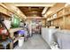 Laundry room features a washing machine, dryer, work bench, shelving, and other storage items at 17200 W Bell Rd # 652, Surprise, AZ 85374