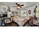 Inviting bedroom with decorative shelves, natural light, and a comfortable bed for a serene retreat at 18601 N 45Th Dr, Glendale, AZ 85308