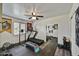 Home gym equipped with a treadmill, weights, and mirrored wall, perfect for fitness enthusiasts at 18601 N 45Th Dr, Glendale, AZ 85308