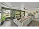 Bright living room boasts hardwood floors, contemporary decor, and ample natural light at 18601 N 45Th Dr, Glendale, AZ 85308