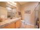 Bathroom with light wood cabinets and granite countertop and separate shower stall at 19700 N 76Th St # 2091, Scottsdale, AZ 85255