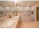 Modern bathroom with dual sinks, a walk-in shower, and tile floors at 19700 N 76Th St # 2091, Scottsdale, AZ 85255