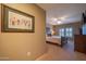 View of the bedroom featuring carpet floors, a ceiling fan and large windows at 19700 N 76Th St # 2091, Scottsdale, AZ 85255