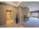 Hallway with tile and carpet leads to other rooms and the outdoor balcony at 19700 N 76Th St # 2091, Scottsdale, AZ 85255