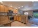 Bright kitchen with stainless steel appliances, tile flooring and granite countertops at 19700 N 76Th St # 2091, Scottsdale, AZ 85255