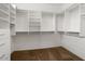 Walk-in closet featuring built-in shelving and ample storage space at 20017 N Cielo Ct, Surprise, AZ 85374