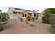 Charming single-story home with desert landscaping, a tile roof, and solar panels at 20017 N Cielo Ct, Surprise, AZ 85374