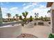 Manicured front yard with desert landscaping, pathway, and a view of surrounding homes at 20017 N Cielo Ct, Surprise, AZ 85374
