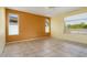 Spacious living room features neutral paint, recessed lighting, and ceramic tile floors at 20017 N Cielo Ct, Surprise, AZ 85374