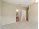 This bedroom has neutral walls, carpet flooring, and en suite bathroom at 20017 N Cielo Ct, Surprise, AZ 85374