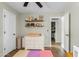 Bright Bedroom with ample storage, floating shelves, changing table and play area for  at 2026 S Emerson --, Mesa, AZ 85210