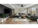 Comfortable living room with a large gray sectional sofa, modern decor, and abundant natural light at 2026 S Emerson --, Mesa, AZ 85210