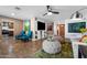 Spacious living room featuring tile floors, modern decor, and an open layout perfect for entertaining at 2218 W Curry St, Chandler, AZ 85224