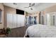 Open main bedroom with sliding glass doors to patio, closet, and ensuite bathroom at 2218 W Curry St, Chandler, AZ 85224