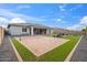 Backyard featuring a sand volleyball court, artificial turf, and covered patio seating at 23060 E Sonoqui Blvd, Queen Creek, AZ 85142