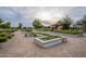 Community garden with raised planting beds and desert landscaping at 23060 E Sonoqui Blvd, Queen Creek, AZ 85142