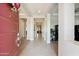 Inviting entryway featuring tile flooring, high ceilings, and a clear view into the home's open-concept living spaces at 23060 E Sonoqui Blvd, Queen Creek, AZ 85142