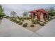 Inviting outdoor park space featuring a pergola, walking path, and meticulously maintained landscaping at 23060 E Sonoqui Blvd, Queen Creek, AZ 85142