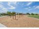 Community playground with multiple swings and shade structures for resident enjoyment at 23060 E Sonoqui Blvd, Queen Creek, AZ 85142