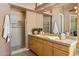 Bathroom showcases a walk-in shower, vanity with ample storage, mirror and decorative accents at 23520 N 80Th Way, Scottsdale, AZ 85255