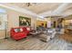 Open-concept living area with kitchen view features coffered ceilings and stylish decor at 23520 N 80Th Way, Scottsdale, AZ 85255