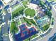 Aerial shot of the community tennis and sports facilities, lush landscaping, and clubhouse at 247 E Las Puertas Ln, Queen Creek, AZ 85140