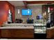 Modern cafe area with stylish counter, display case, and menu board, perfect for a quick bite and coffee at 247 E Las Puertas Ln, Queen Creek, AZ 85140