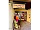 Mossa Athletic Club and Alvea Spa entryway with bench and merchandise at 247 E Las Puertas Ln, Queen Creek, AZ 85140