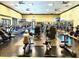 A modern gym features updated equipment, plenty of floor space, and large windows for natural light at 247 E Las Puertas Ln, Queen Creek, AZ 85140