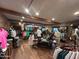 Well-stocked golf pro shop with shirts, hats, and golf accessories at 247 E Las Puertas Ln, Queen Creek, AZ 85140
