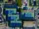 Aerial shot of well-maintained tennis courts within a community setting at 247 E Las Puertas Ln, Queen Creek, AZ 85140