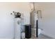 Utility room shows an Ultima water filter and water heater at 247 E Las Puertas Ln, Queen Creek, AZ 85140
