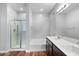 Bathroom with walk-in shower, soaking tub, and double sink vanity at 24868 W Kowalsky Ln, Buckeye, AZ 85326