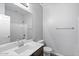 Bathroom featuring a large mirror, modern vanity, and a shower-tub combination at 24868 W Kowalsky Ln, Buckeye, AZ 85326
