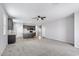 Open living room showcasing the kitchen at 24868 W Kowalsky Ln, Buckeye, AZ 85326