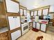 Charming kitchen features a gas range, ample cabinet space, and warm, inviting decor at 25 S 102Nd St # 47, Mesa, AZ 85208